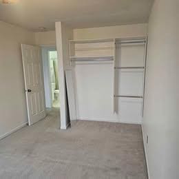 unfurnished bedroom featuring a closet