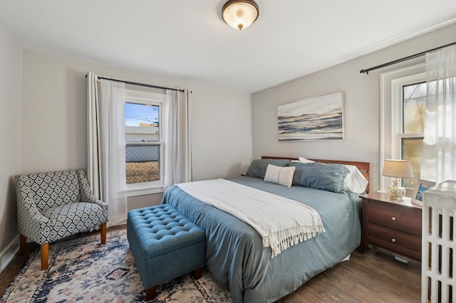 bedroom with wood finished floors