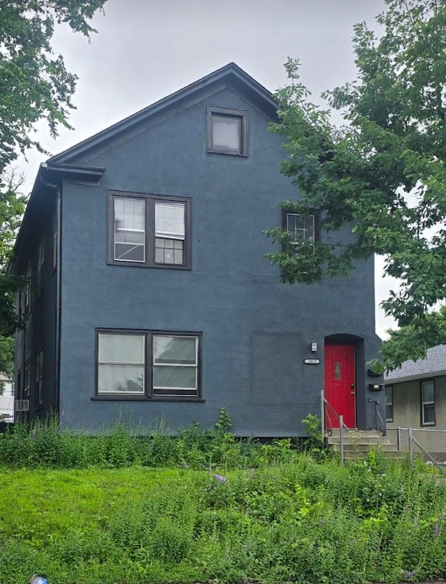 exterior space with stucco siding