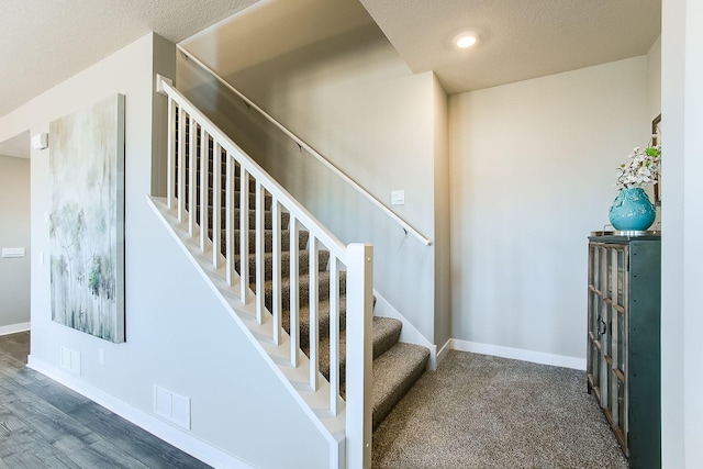 4601 Percheron Blvd, Chaska, MN 55318 - stairway featuring a textured ceiling, baseboards, visible vents, and recessed lighting
