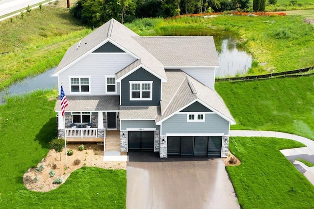 4601 Percheron Blvd, Chaska, MN 55318 - view of front of home with a garage, driveway, and stone siding