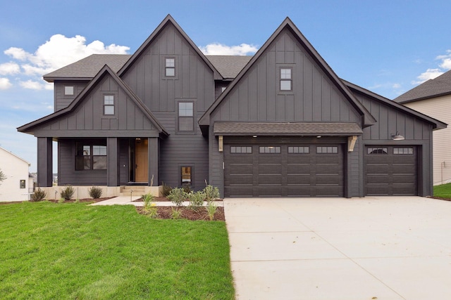 modern farmhouse with driveway, a front lawn, board and batten siding, and a shingled roof