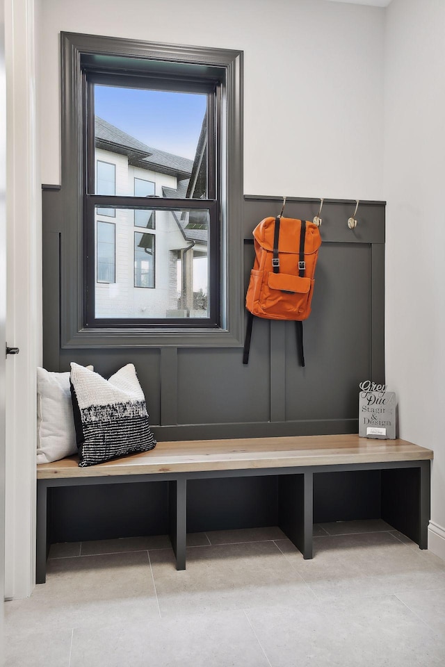 mudroom with tile patterned floors