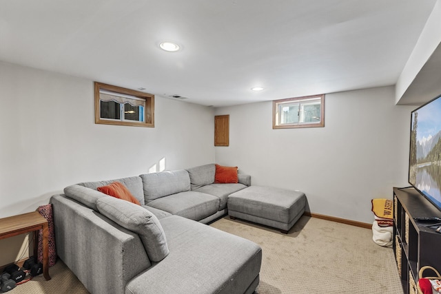 living room featuring baseboards, recessed lighting, visible vents, and light colored carpet