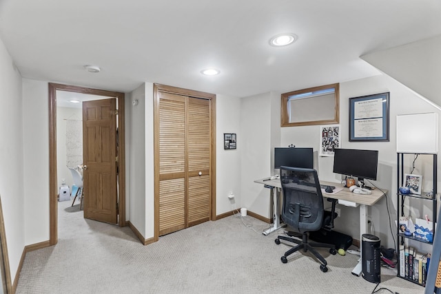 office area featuring recessed lighting, baseboards, and light colored carpet