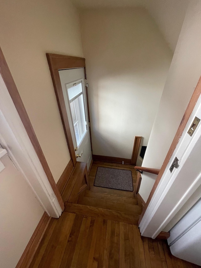 hallway with wood finished floors