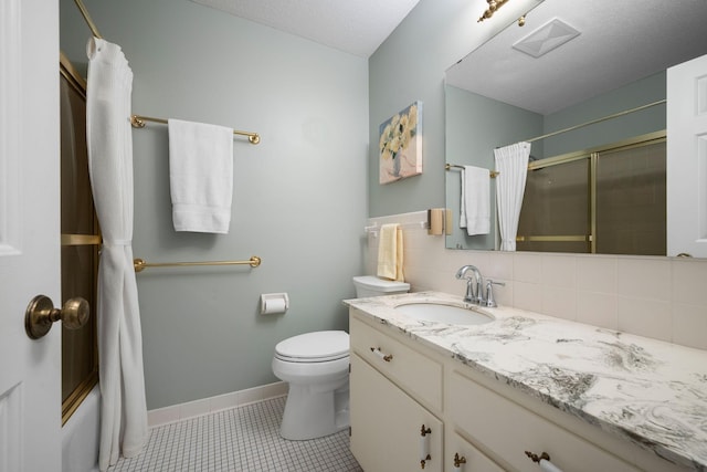 2135 Shadyview Ln N, Plymouth, MN 55447 - full bathroom featuring vanity, toilet, tile patterned flooring, tasteful backsplash, and baseboards