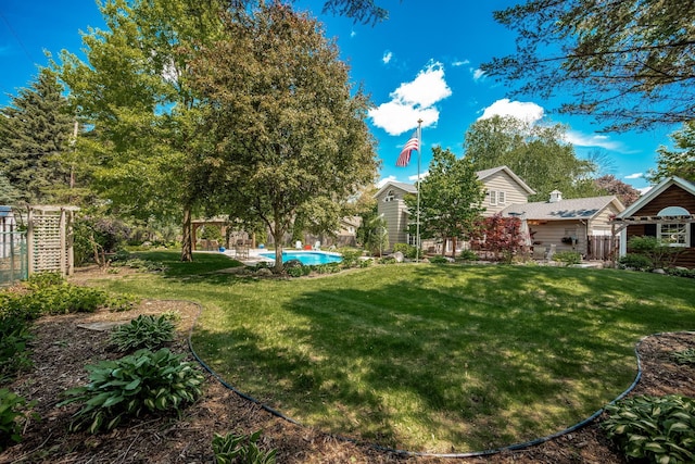 2135 Shadyview Ln N, Plymouth, MN 55447 - view of grassy yard with an outdoor pool