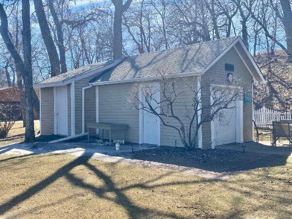 garage with fence