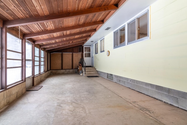 interior space with wooden ceiling and vaulted ceiling with beams