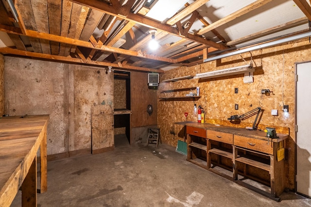 basement with a workshop area