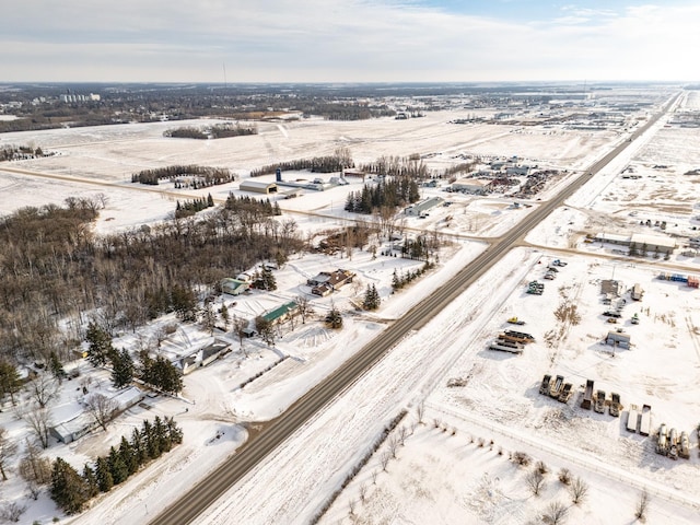 snowy aerial view with a rural view