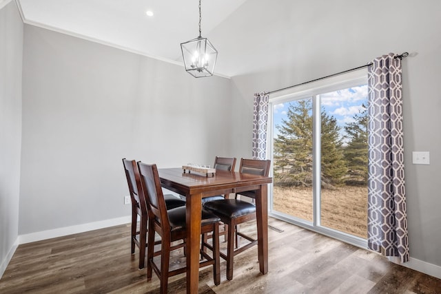 9764 Saint Andrews Dr, Elko New Market, MN 55020 - dining room featuring a chandelier, lofted ceiling, wood finished floors, baseboards, and recessed lighting