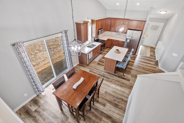 9764 Saint Andrews Dr, Elko New Market, MN 55020 - living room with light wood finished floors, recessed lighting, a towering ceiling, and baseboards