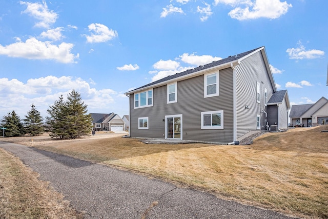 9764 Saint Andrews Dr, Elko New Market, MN 55020 - view of side of home with a lawn