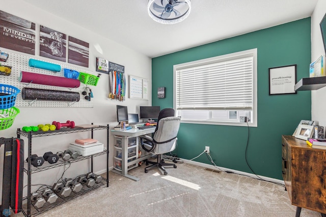 office area with light colored carpet and baseboards