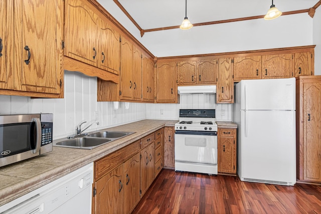 3879 Polk St NE, Columbia Heights, MN 55421 - kitchen featuring a sink, decorative backsplash, under cabinet range hood, brown cabinetry, and white appliances