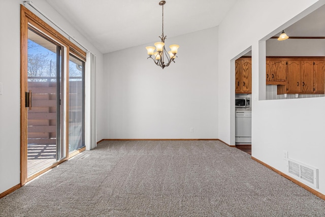 3879 Polk St NE, Columbia Heights, MN 55421 - carpeted spare room with visible vents, vaulted ceiling, a chandelier, and baseboards