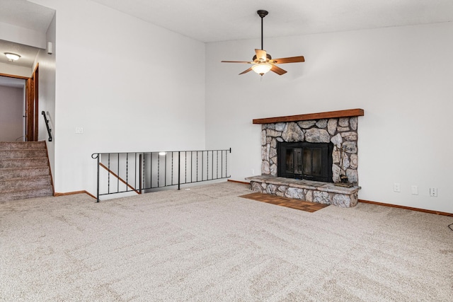 3879 Polk St NE, Columbia Heights, MN 55421 - unfurnished living room with a fireplace, ceiling fan, carpet flooring, and baseboards