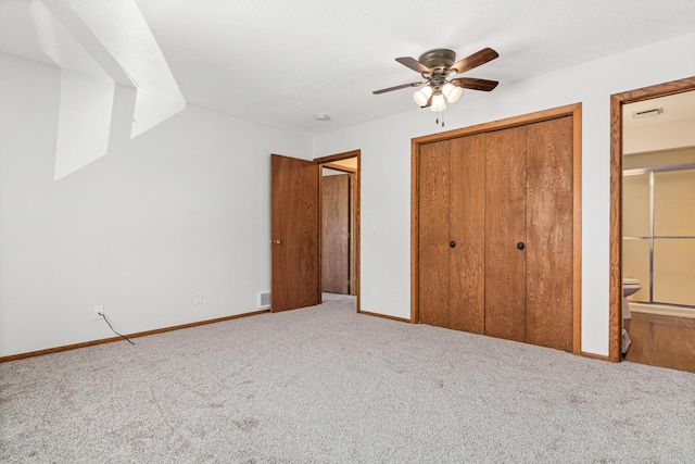 3879 Polk St NE, Columbia Heights, MN 55421 - unfurnished bedroom featuring carpet, visible vents, and a closet