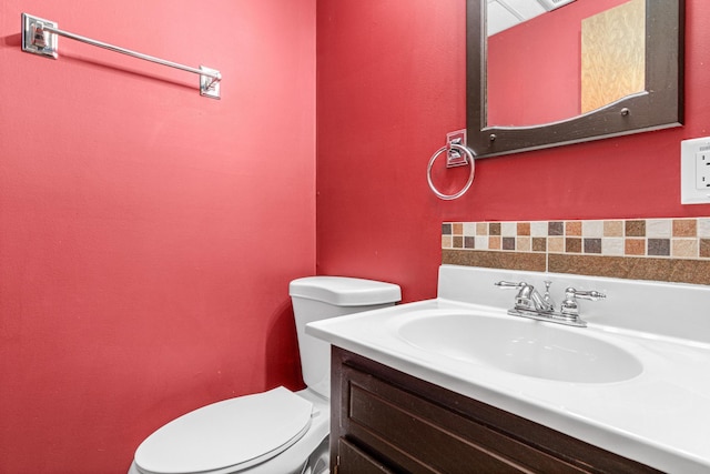 3879 Polk St NE, Columbia Heights, MN 55421 - half bathroom featuring vanity and toilet