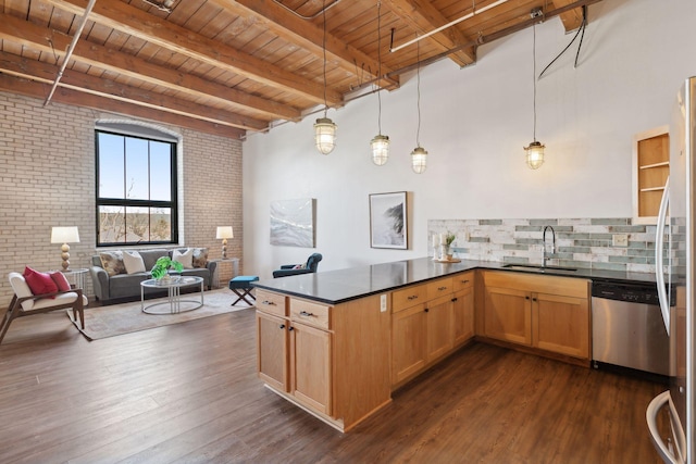 kitchen with dark wood-type flooring, a sink, wood ceiling, stainless steel dishwasher, and dark countertops