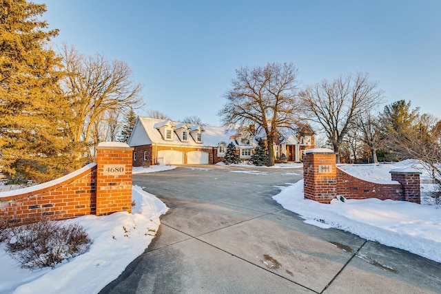 view of road with concrete driveway