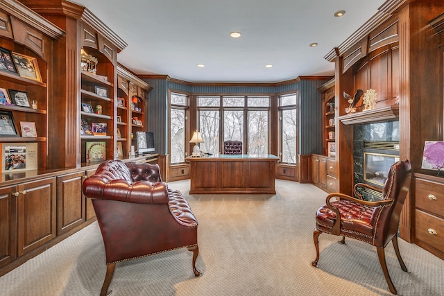 office space featuring ornamental molding, a high end fireplace, light carpet, and recessed lighting