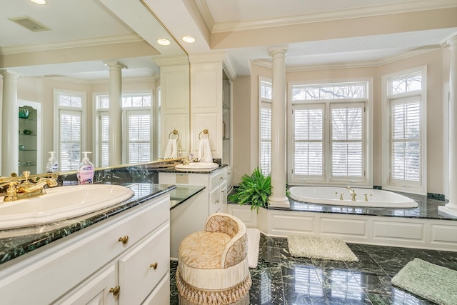 full bathroom featuring marble finish floor, a garden tub, visible vents, and ornate columns