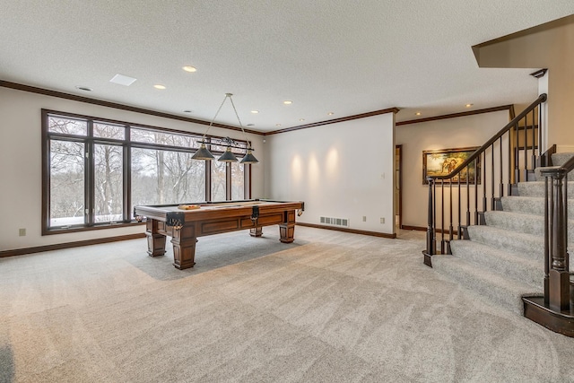 game room with light carpet, visible vents, and baseboards