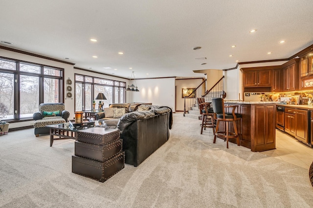 living area featuring light carpet, stairs, and ornamental molding