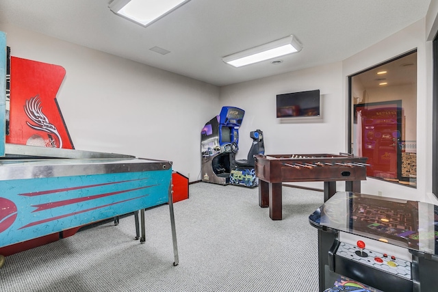 recreation room featuring carpet flooring