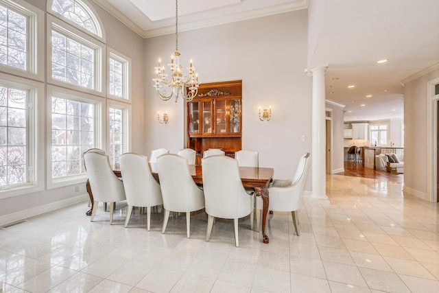 4680 152nd Ct NW, Ramsey, MN 55303 - dining space featuring ornamental molding, light tile patterned floors, a chandelier, decorative columns, and recessed lighting