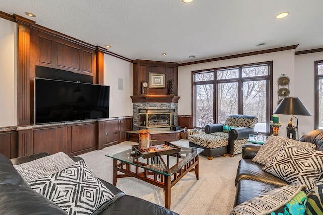 4680 152nd Ct NW, Ramsey, MN 55303 - living area with ornamental molding, light colored carpet, wainscoting, recessed lighting, and a fireplace