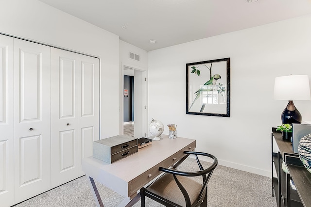 office space featuring visible vents and baseboards