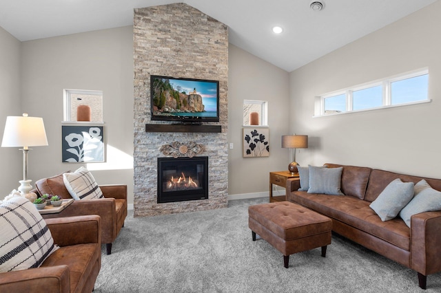 living area with high vaulted ceiling, carpet floors, a fireplace, visible vents, and baseboards