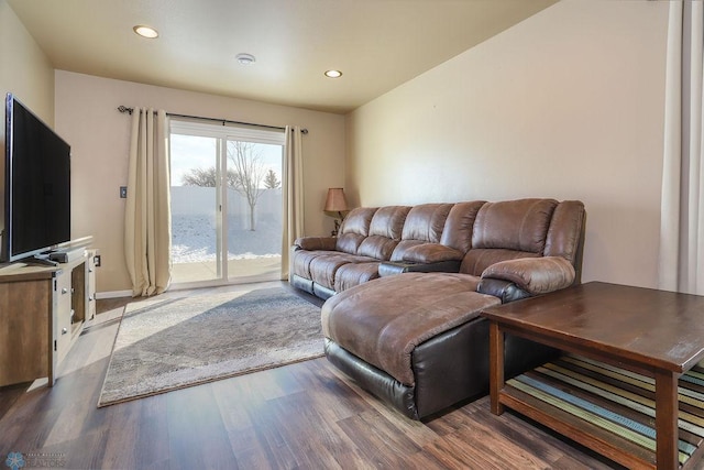 living area with recessed lighting and wood finished floors