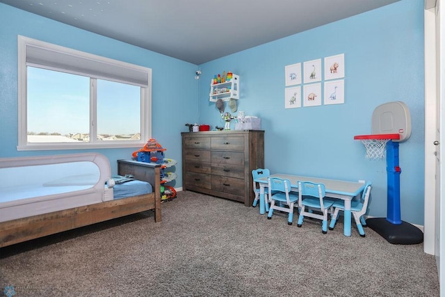 bedroom featuring carpet