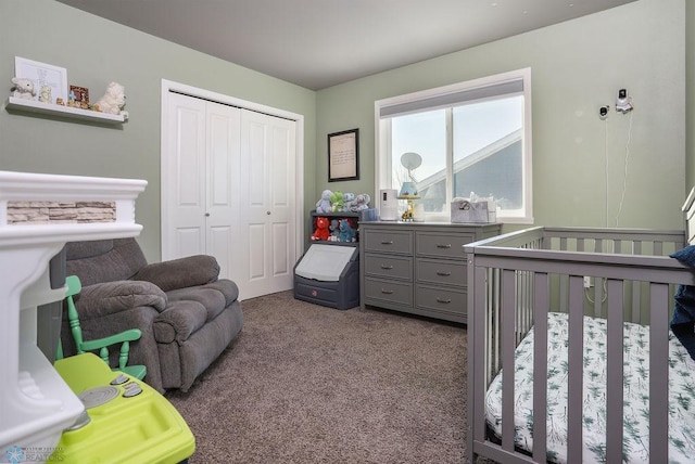 bedroom with carpet and a closet