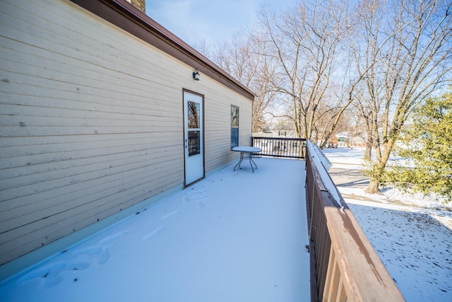 view of snow covered deck