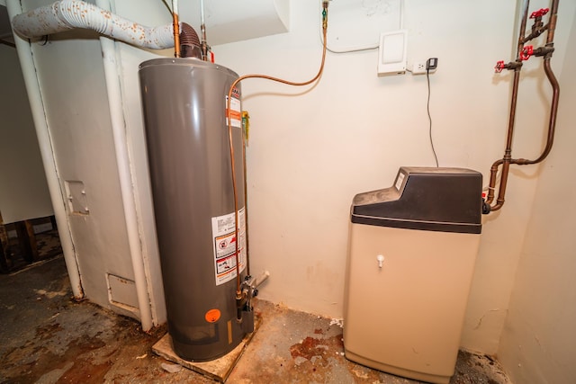 utility room featuring water heater