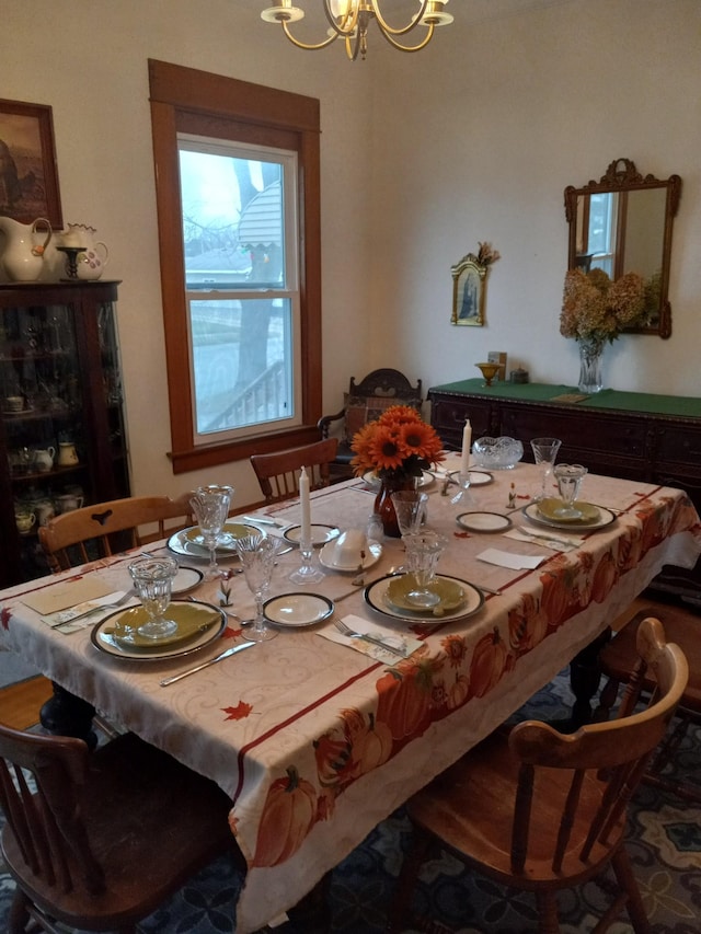 dining room with a notable chandelier