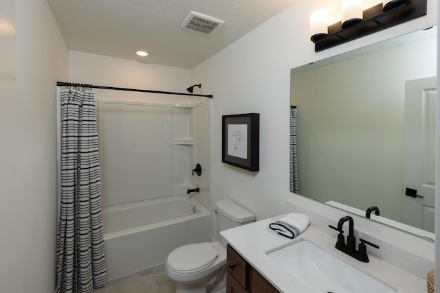 full bathroom with shower / tub combo, visible vents, toilet, a textured ceiling, and vanity