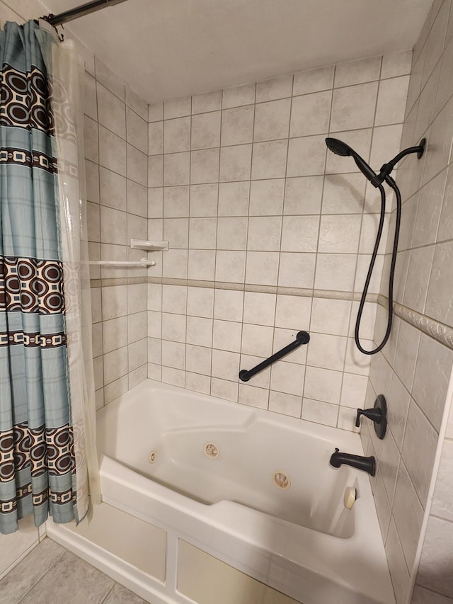 full bathroom featuring tile patterned flooring and a combined bath / shower with jetted tub