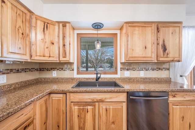 kitchen featuring decorative backsplash, dishwasher, decorative light fixtures, light brown cabinetry, and a sink