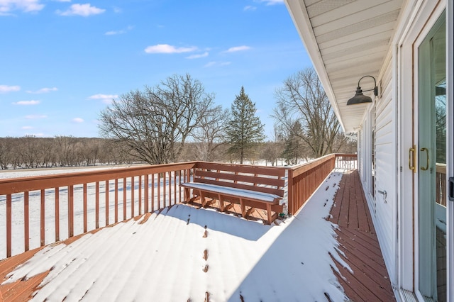 view of snow covered deck