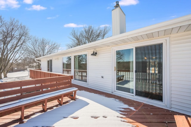 view of snow covered deck