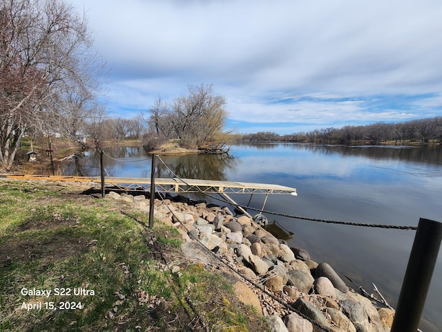 view of dock with a water view