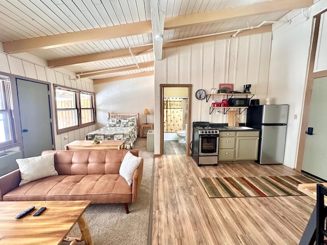 living room featuring wooden walls, wood ceiling, beam ceiling, and light wood-style flooring