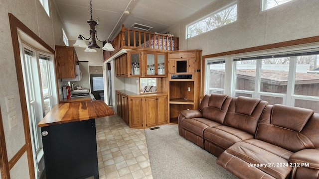 2945 County Road 4 SW Unit 118, Cokato, MN 55321 - living room featuring a towering ceiling